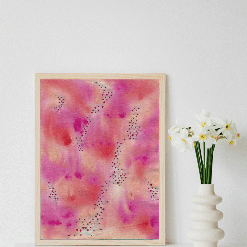 Abstract art piece with a pattern of repetitive brushstrokes in various shades of pink, enhanced by intricate embroidery. The combination of painted and embroidered elements creates a visually dynamic and textured composition.
