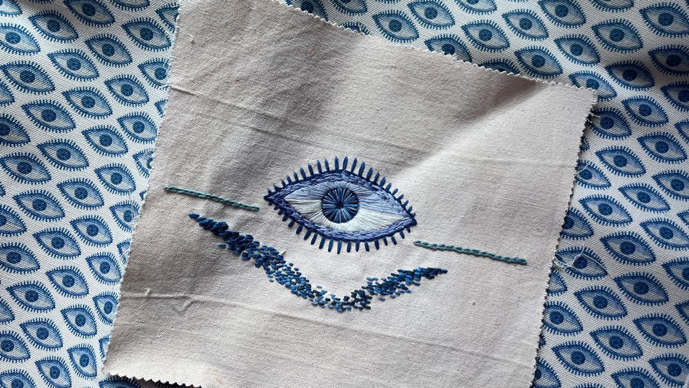 Hand embroidered original artwork alongside printed linen fabric, Thalia Botsari collection