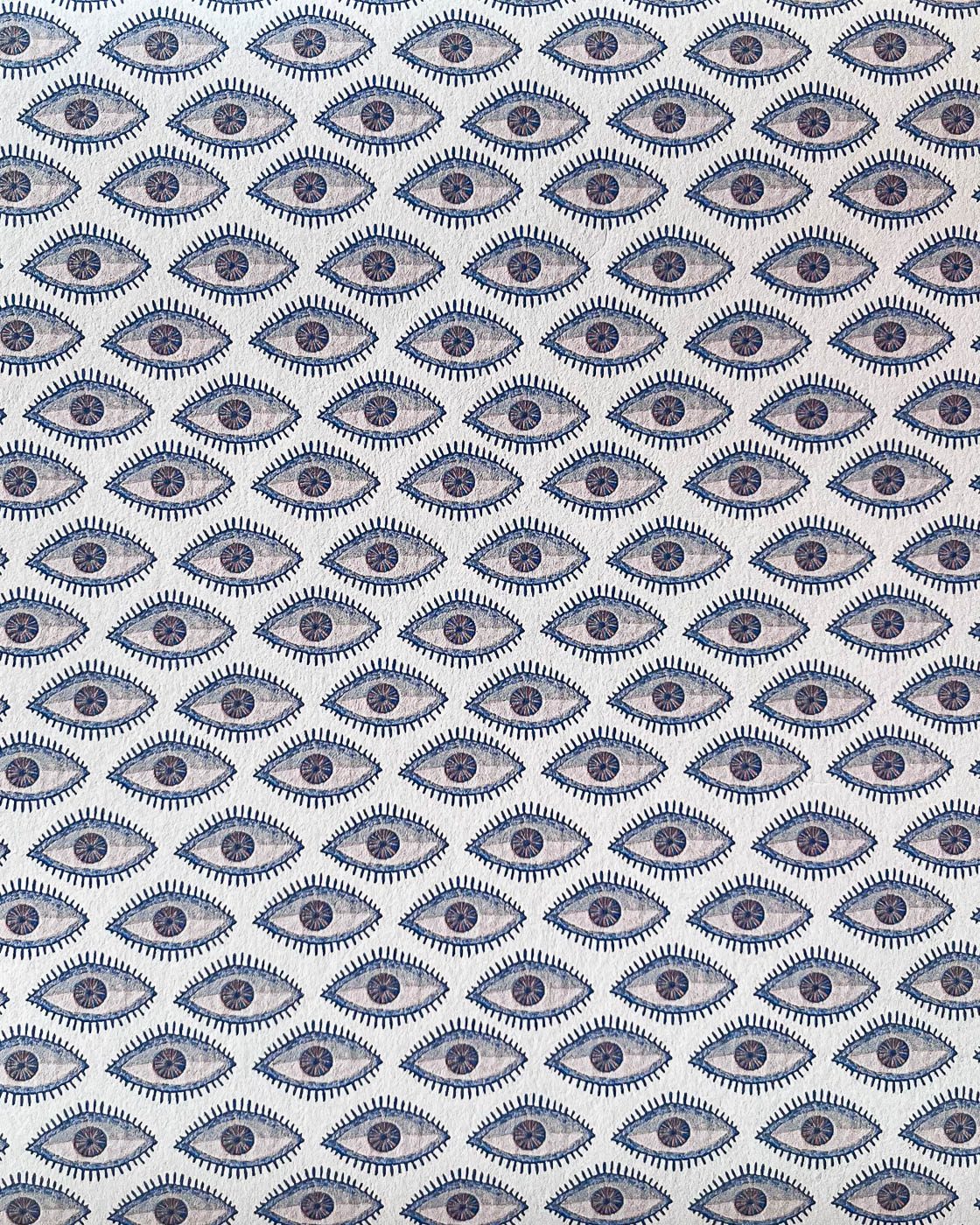 Evil eye wallpaper close up blue beige
